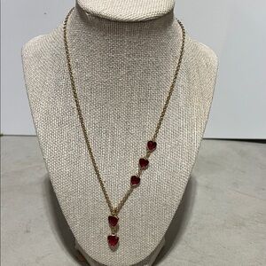 Elegant Gold Necklace with Red Heart Pendants